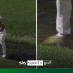 Finau plays shot with feet submerged in water hazard!