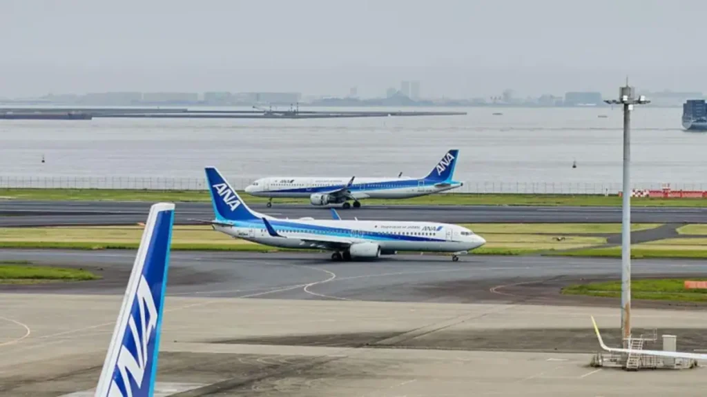 Japan flight makes emergency landing after passenger tries to open door mid-air