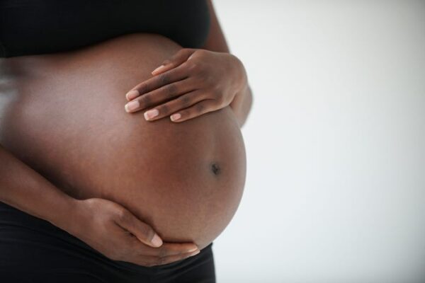 Pregnant woman found hanging from tree