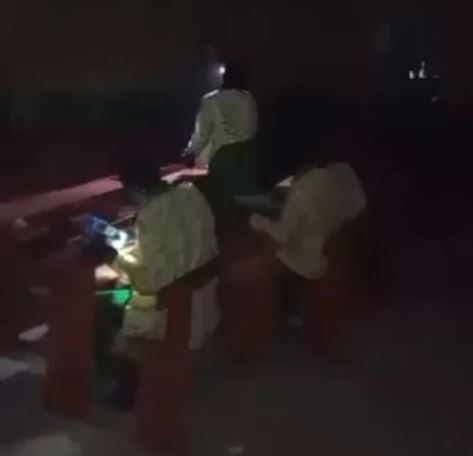 Outrage As Students Sit For WAEC Exam At Night With Torch Light In Asaba (Video)